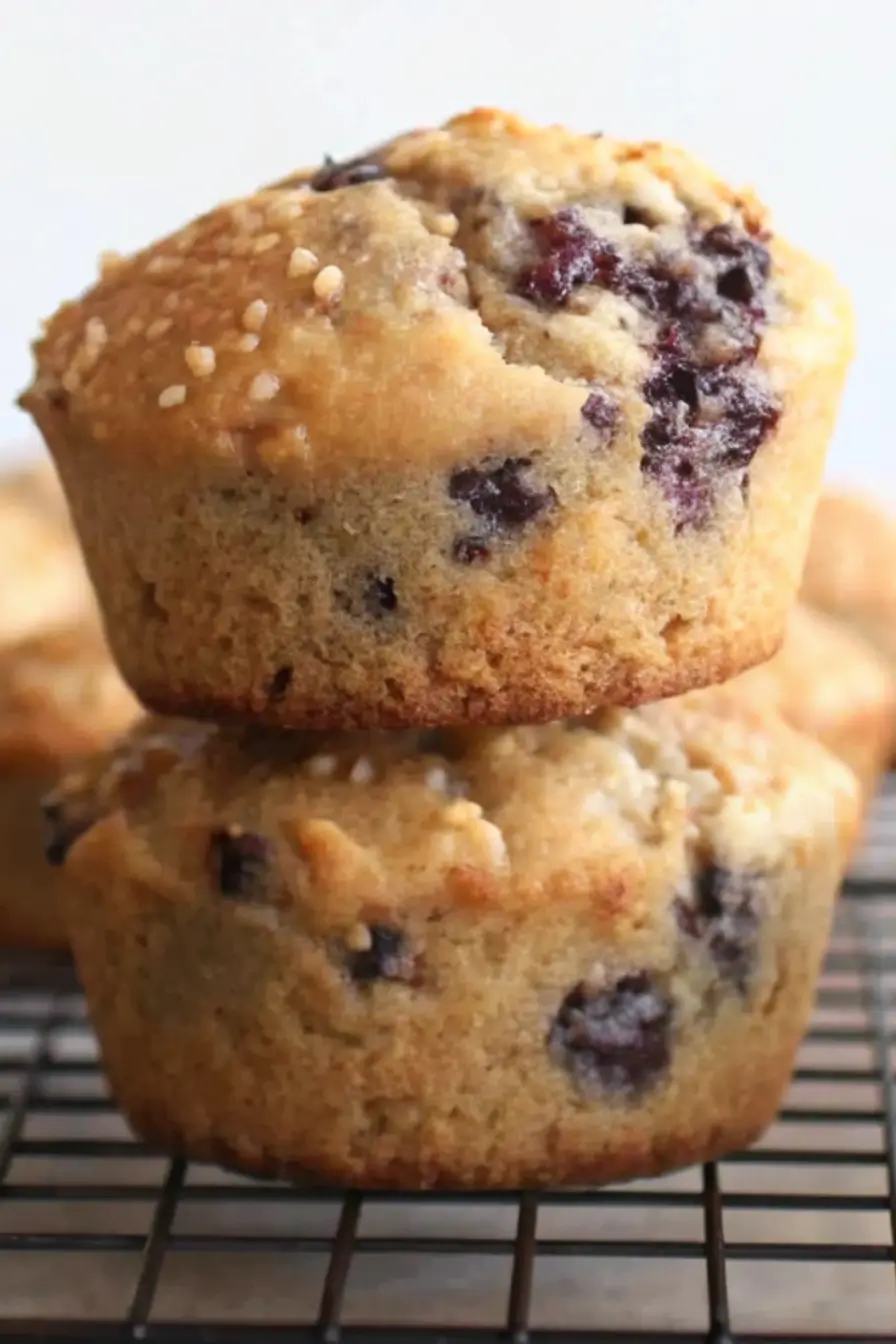 Freshly baked blackberry oatmeal muffin on a plate